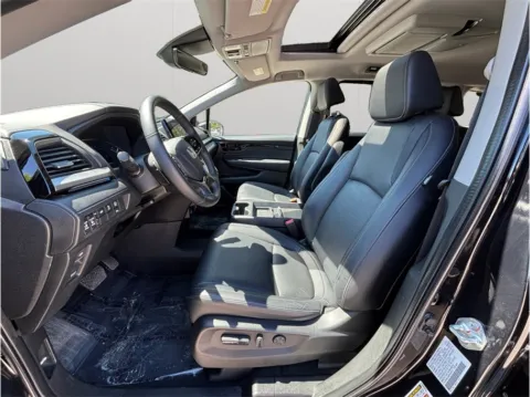 Photos of 2023 Honda Odyssey Touring Minivan 4D for sale in Jacksonville, FL at Merit Auto Group Lem Turner