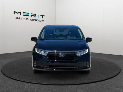 Another view of 2023 Honda Odyssey Touring Minivan 4D for sale in Jacksonville, FL at Merit Auto Group Lem Turner