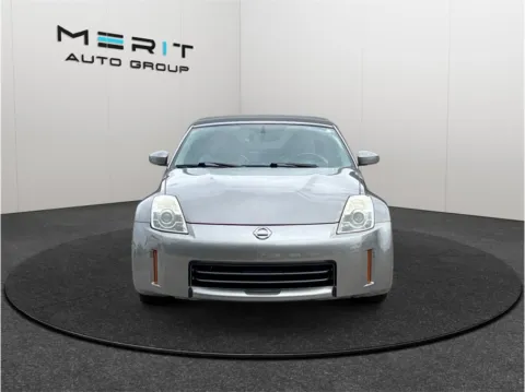 Another view of 2009 Nissan 350Z Touring Roadster 2D for sale in Jacksonville, FL at Merit Auto Group Lem Turner