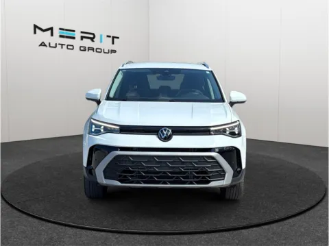 Another view of 2025 Volkswagen Taos SE 4MOTION Sport Utility 4D for sale in Jacksonville, FL at Merit Auto Group Lem Turner