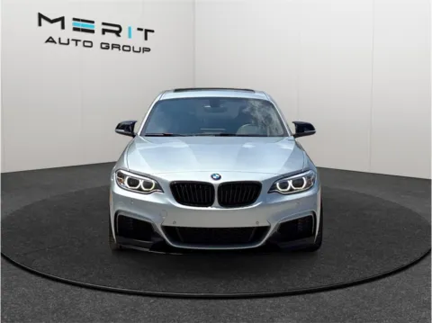 Another view of 2017 BMW 2 Series M240i Coupe 2D for sale in Jacksonville, FL at Merit Auto Group Lem Turner