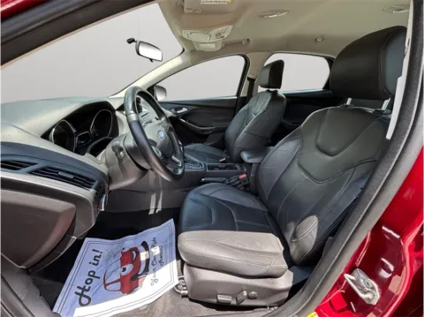Photos of 2015 Ford Focus SE Sedan 4D for sale in Jacksonville, FL at Merit Auto Group Lem Turner