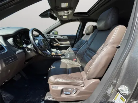 Photos of 2023 Mazda CX-9 Signature Sport Utility 4D for sale in Jacksonville, FL at Merit Auto Group Lem Turner