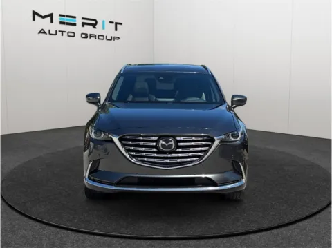 Another view of 2023 Mazda CX-9 Signature Sport Utility 4D for sale in Jacksonville, FL at Merit Auto Group Lem Turner