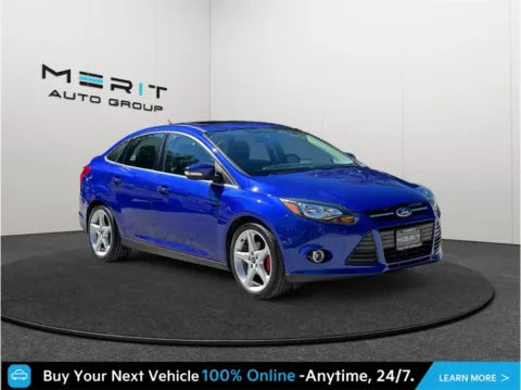 Blue 2014 Ford Focus Titanium Sedan 4D for sale in Jacksonville, FL