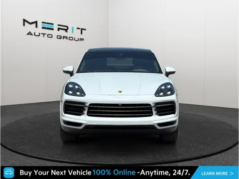 Photos of 2022 Porsche Cayenne Coupe Platinum Edition Sport Utility 4D for sale in Jacksonville, FL at Merit Auto Group Lem Turner
