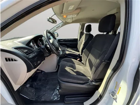 Photos of 2018 Dodge Grand Caravan Passenger SE Minivan 4D for sale in Jacksonville, FL at Merit Auto Group Lem Turner