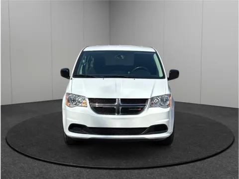 Another view of 2018 Dodge Grand Caravan Passenger SE Minivan 4D for sale in Jacksonville, FL at Merit Auto Group Lem Turner