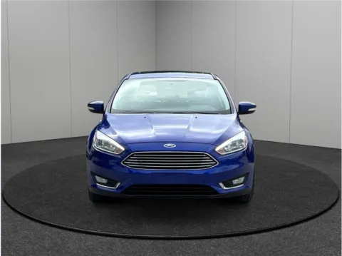 Another view of 2015 Ford Focus Titanium Sedan 4D for sale in Jacksonville, FL at Merit Auto Group Lem Turner