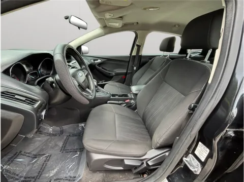 Photos of 2015 Ford Focus SE Sedan 4D for sale in Jacksonville, FL at Merit Auto Group Lem Turner