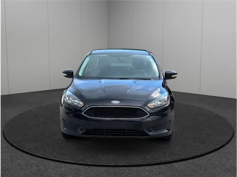 Another view of 2015 Ford Focus SE Sedan 4D for sale in Jacksonville, FL at Merit Auto Group Lem Turner