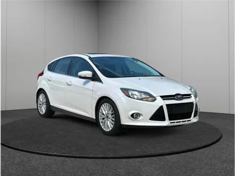White 2014 Ford Focus Titanium Hatchback 4D for sale in Jacksonville, FL