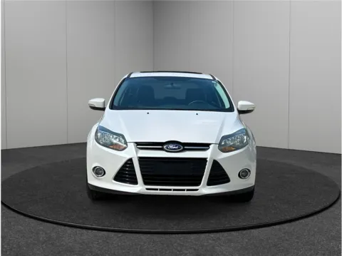 Another view of 2014 Ford Focus Titanium Hatchback 4D for sale in Jacksonville, FL at Merit Auto Group Lem Turner