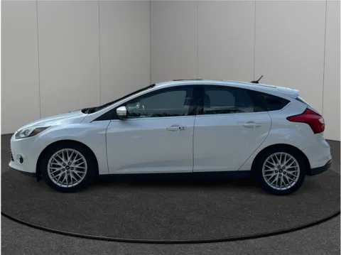 More photos of 2014 Ford Focus Titanium Hatchback 4D at Merit Auto Group Lem Turner, FL