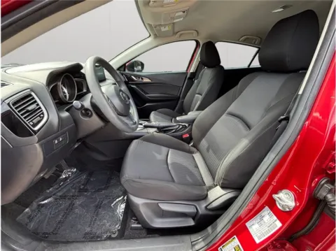 Photos of 2016 Mazda MAZDA3 i Sport Hatchback 4D for sale in Jacksonville, FL at Merit Auto Group Lem Turner