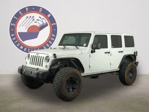 Photos of 2014 Jeep Wrangler Unlimited Freedom Edition for sale in Fort Walton Beach, FL at Step One Cadillac GMC Fort Walton Beach