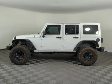 Another view of 2014 Jeep Wrangler Unlimited Freedom Edition for sale in Fort Walton Beach, FL at Step One Cadillac GMC Fort Walton Beach