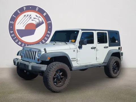 Photos of 2010 Jeep Wrangler Unlimited Sport for sale in Fort Walton Beach, FL at Step One Cadillac GMC Fort Walton Beach