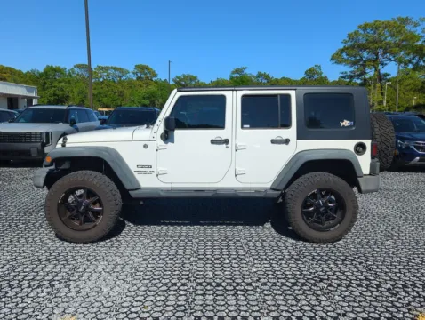 Another view of 2010 Jeep Wrangler Unlimited Sport for sale in Fort Walton Beach, FL at Step One Cadillac GMC Fort Walton Beach