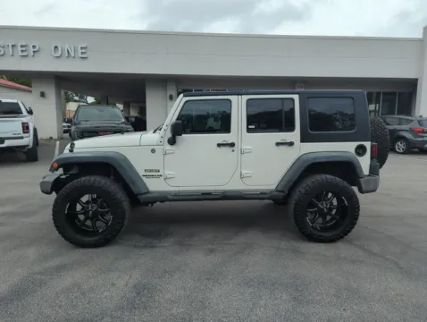 Another view of 2010 Jeep Wrangler Unlimited Sport for sale in Fort Walton Beach, FL at Step One Cadillac GMC Fort Walton Beach