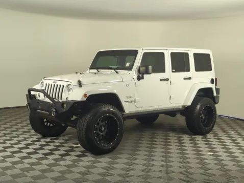 Photos of 2018 Jeep Wrangler JK Unlimited Sahara for sale in Fort Walton Beach, FL at Step One Cadillac GMC Fort Walton Beach