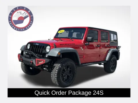 Red 2014 Jeep Wrangler Unlimited Sport for sale in Pensacola, FL