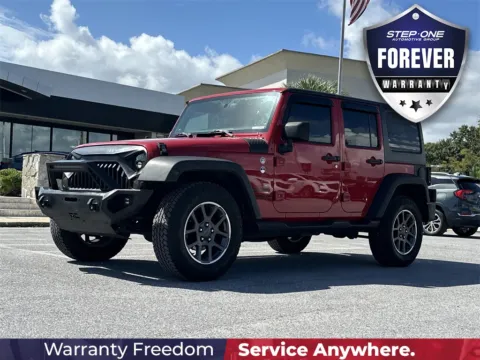 Red 2014 Jeep Wrangler Unlimited Sport for sale in Pensacola, FL