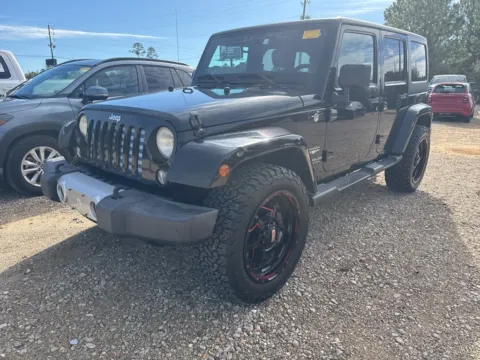 Black 2014 Jeep Wrangler Unlimited Sahara for sale in Crestview, FL
