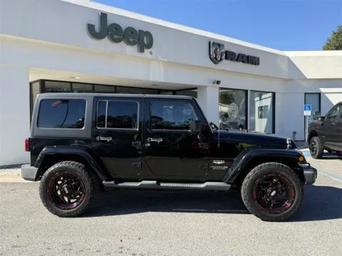 More photos of 2014 Jeep Wrangler Unlimited Sahara at Step One CDJR Fiat Crestview, FL