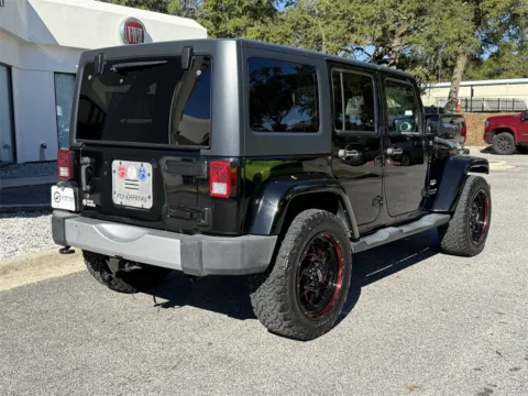 More photos of 2014 Jeep Wrangler Unlimited Sahara at Step One CDJR Fiat Crestview, FL