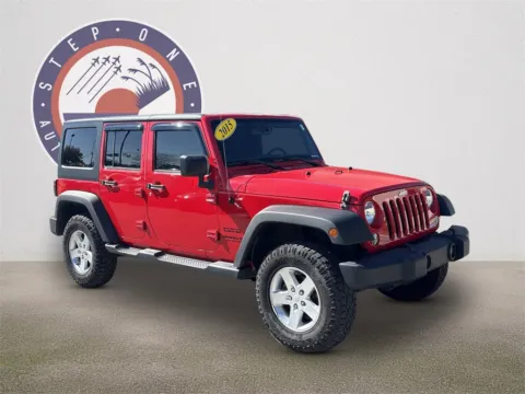 Red 2015 Jeep Wrangler Unlimited Sport for sale in Crestview, FL