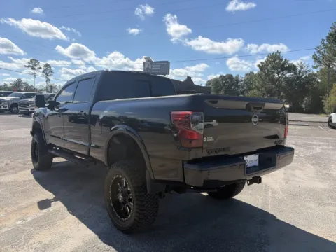 More photos of 2017 Nissan Titan XD PRO-4X at Step One CDJR Fiat Crestview, FL