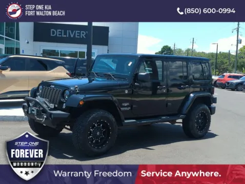 Black 2014 Jeep Wrangler Unlimited Sahara for sale in Fort Walton Beach, FL