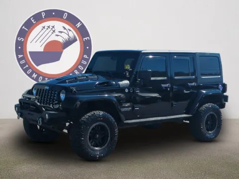 Photos of 2015 Jeep Wrangler Unlimited Sahara for sale in Fort Walton Beach, FL at Step One Kia Fort Walton Beach