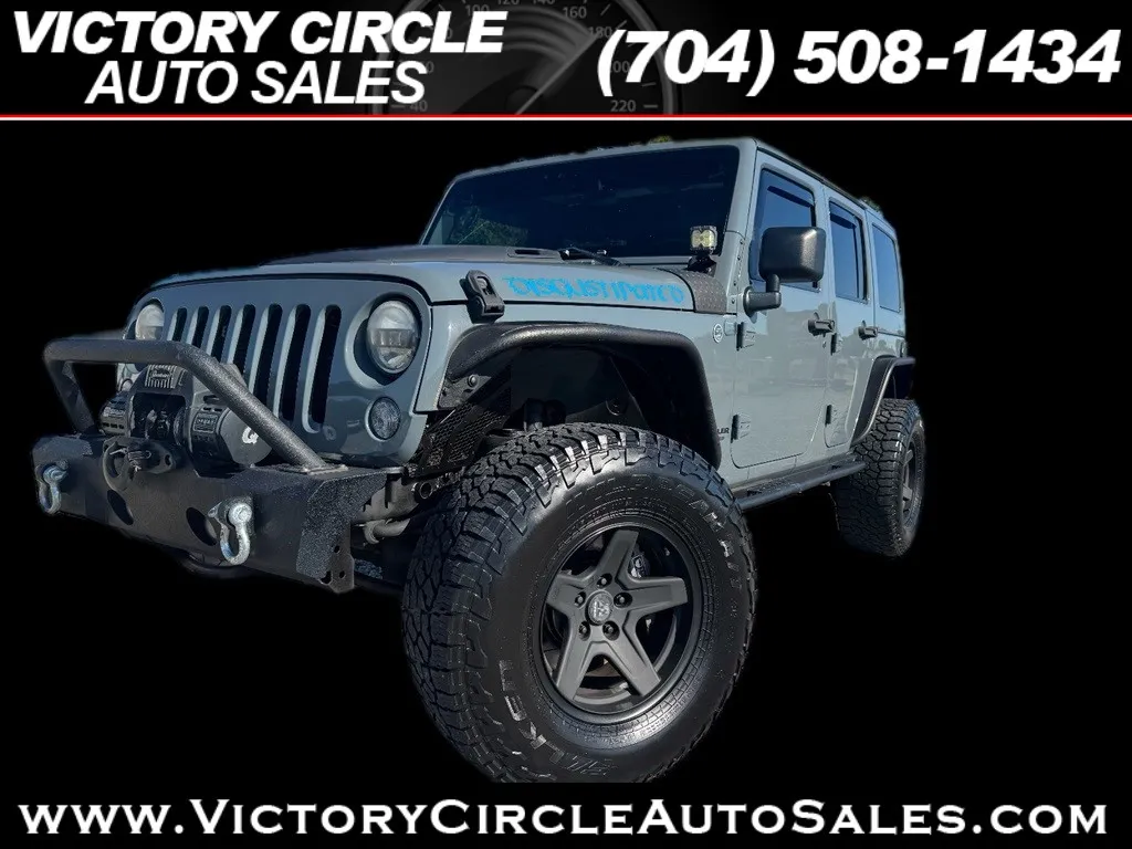 Gray 2014 Jeep Wrangler Unlimited Sahara 4WD for sale in Troutman, NC