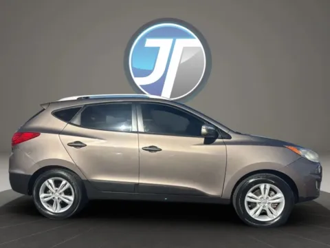 Another view of 2013 Hyundai Tucson GLS Sport Utility 4D for sale in Broken Arrow, OK at JT Wholesale Auto, Inc.