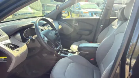 Another view of 2015 Hyundai Tucson GLS Sport Utility 4D for sale in Broken Arrow, OK at JT Wholesale Auto, Inc.