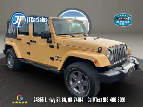 Yellow 2013 Jeep Wrangler Unlimited Sport Freedom Edition Sport Utility 4D for sale in Broken Arrow, OK