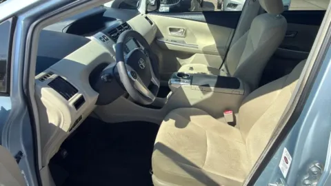 Photos of 2014 Toyota Prius v Three Wagon 4D for sale in Broken Arrow, OK at JT Wholesale Auto, Inc.