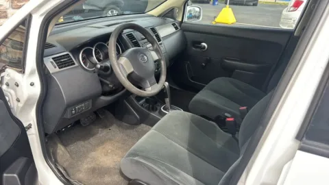 Photos of 2010 Nissan Versa S Hatchback 4D for sale in Broken Arrow, OK at JT Wholesale Auto, Inc.