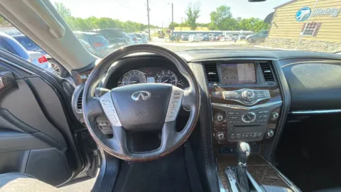 Another view of 2015 INFINITI QX80 Sport Utility 4D for sale in Broken Arrow, OK at JT Wholesale Auto, Inc.