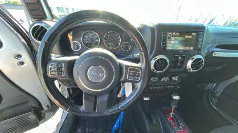 Another view of 2016 Jeep Wrangler Unlimited Rubicon Sport Utility 4D for sale in Broken Arrow, OK at JT Wholesale Auto, Inc.