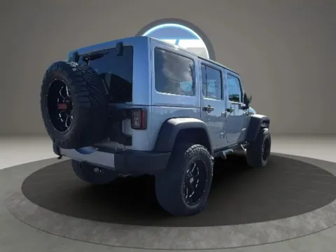 Another view of 2016 Jeep Wrangler Unlimited Rubicon Sport Utility 4D for sale in Broken Arrow, OK at JT Wholesale Auto, Inc.