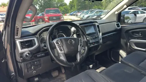 Another view of 2017 Nissan Titan Crew Cab SV Pickup 4D 5 1/2 ft for sale in Broken Arrow, OK at JT Wholesale Auto, Inc.
