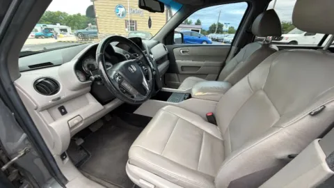 Photos of 2012 Honda Pilot EX-L Sport Utility 4D for sale in Broken Arrow, OK at JT Wholesale Auto, Inc.