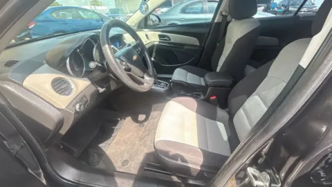 Photos of 2014 Chevrolet Cruze LS Sedan 4D for sale in Broken Arrow, OK at JT Wholesale Auto, Inc.