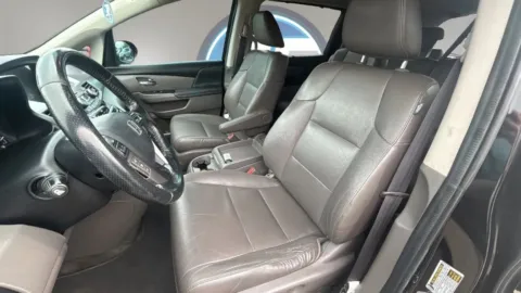 More photos of 2014 Honda Odyssey Touring Minivan 4D at JT Wholesale Auto, Inc., OK