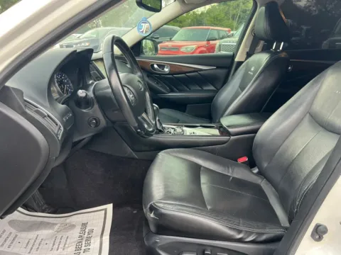 Photos of 2014 INFINITI Q50 3.7 Premium Sedan 4D for sale in Broken Arrow, OK at JT Wholesale Auto, Inc.