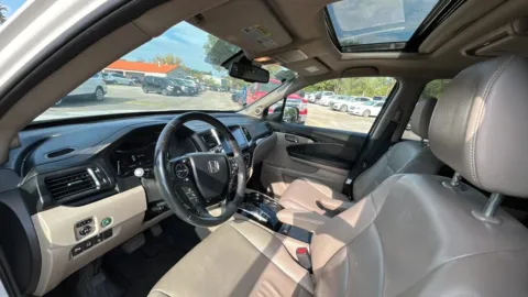 Another view of 2016 Honda Pilot Touring Sport Utility 4D for sale in Broken Arrow, OK at JT Wholesale Auto, Inc.