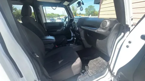 Photos of 2017 Jeep Wrangler Unlimited Sport SUV 4D for sale in Broken Arrow, OK at JT Wholesale Auto, Inc.